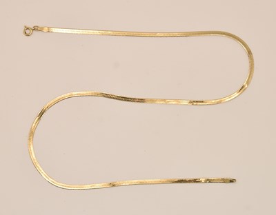 Lot 1379 - A gold flat herringbone semi-rigid necklace,...