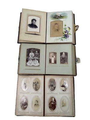 Lot 357 - A family album of Victorian cabinet cards,...