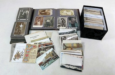 Lot 370 - A mixed box of vintage postcards, used and...