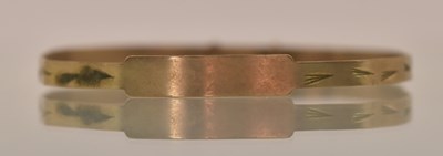 Lot 1422 - A 9ct yellow gold expanding child's bangle,...