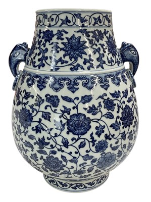 Lot 1068 - A modern Chinese blue and white twin handled...