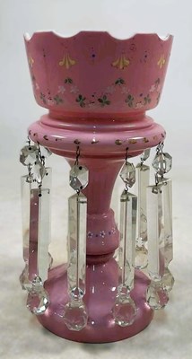Lot 266 - A pink glass lustre with ten cut glass drops,...