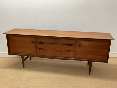 Lot 616 - JOHN HERBERT FOR A YOUNGER LTD; a teak and...