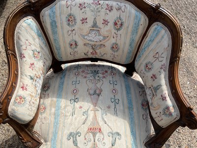 Lot 31 - A late 19th century carved walnut framed...