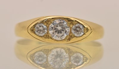 Lot 1332 - An Egyptian yellow gold dress ring set with...