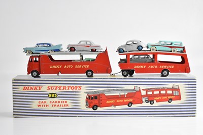Lot 1812 - DINKY; a car carrier with trailer, 983, boxed.