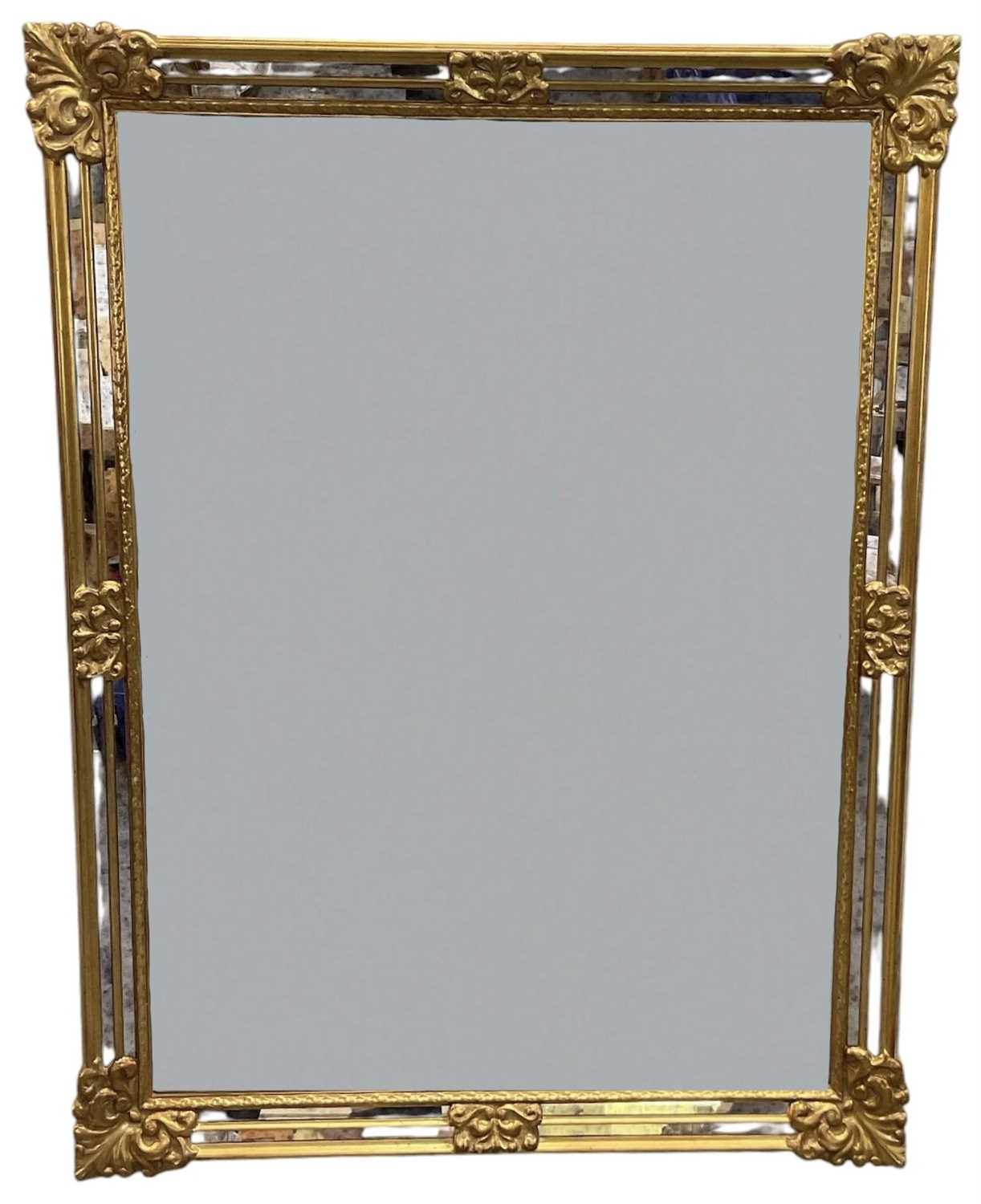 Lot 37 - A modern gilt framed bevelled glass...