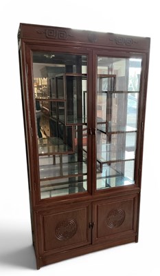 Lot 60 - A modern Chinese carved hardwood display...