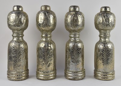 Lot 1115 - A set of four modern decorative white metal...