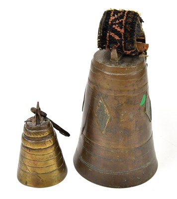 Lot 457 - Two bronze Tibetan temple bells, larger 22cm.