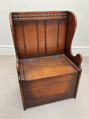 Lot 1094 - TITCHMARSH & GOODWIN; an oak wingback settle...