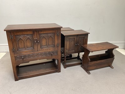 Lot 1109 - A reproduction carved oak cabinet, height 85cm,...
