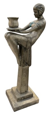Lot 585 - A modern Art Deco style figural candlestick...