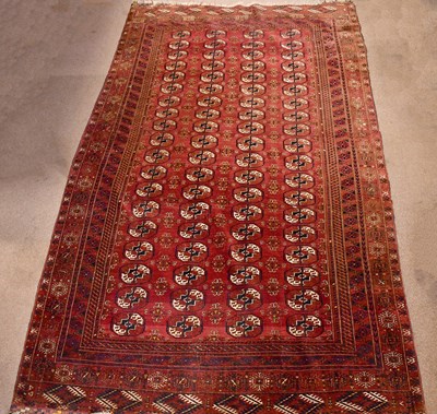 Lot 186 - A red ground hand knotted woollen Bokhara...
