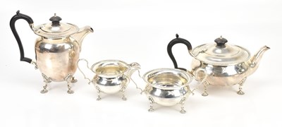 Lot 484 - A hallmarked silver four piece tea service
