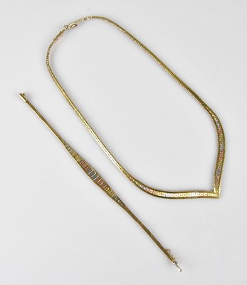 Lot 235 - A 9ct tricolour colour leaf shaped necklace,...