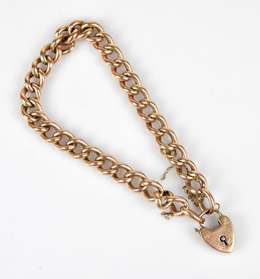 Lot 71 - A 9ct yellow gold flat curb link bracelet,...
