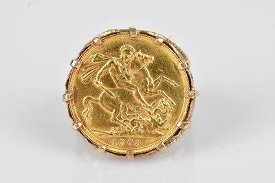 Lot 384 - An Edward VII full sovereign, 1903, set in a...