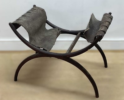 Lot 681 - A mid 20th century mahogany curule chair with...