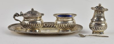 Lot 1158 - An early 20th century sterling silver three...