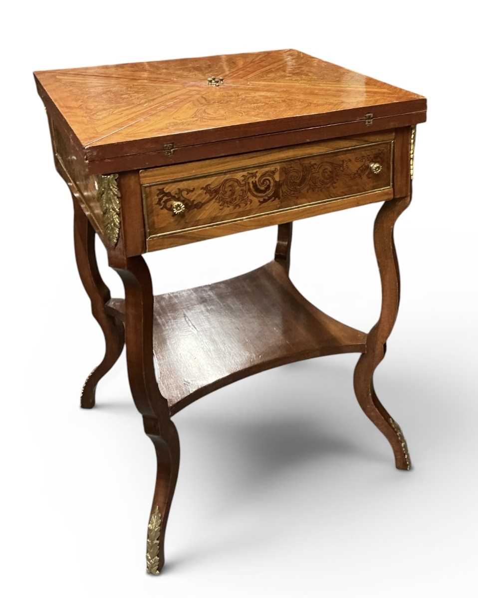 Lot 46 - A reproduction French Empire style kingwood...