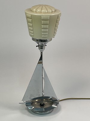Lot 256 - An Art Deco chrome table lamp in the form of a...