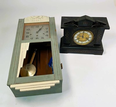 Lot 306 - An Art Deco wall clock with original glass...
