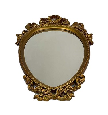 Lot 692 - A late 20th century ornately decorated gilt...