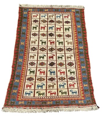Lot 107 - A Sumak kilim, the central cream ground...