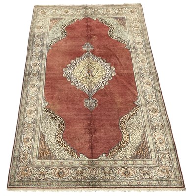 Lot 106 - A Turkish silk ground hand woven carpet, with...