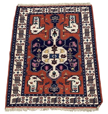 Lot 111 - A North East Persian red ground kilim rug,...