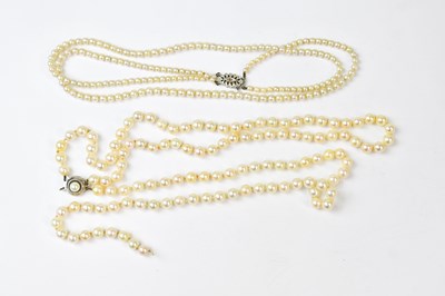 Lot 946 - A double-strand pearl necklace with a 9ct...