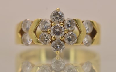 Lot 1292 - An 18ct yellow gold diamond floral cluster set...
