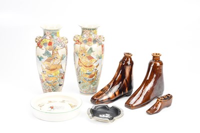 Lot 1524 - Two treacle glaze ankle boot flasks and a...