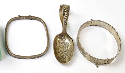 Lot 908 - Two hallmarked silver hinged bracelets, and a...