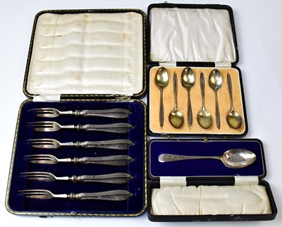Lot 824 - Hallmarked silver flatware comprising a cased...