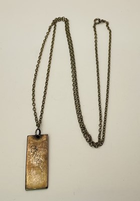 Lot 501 - A hallmarked silver pendant and chain, London...
