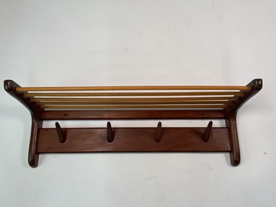 Lot 638 - JOHN HERBERT FOR A YOUNGER LTD; a teak wall...