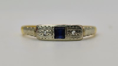 Lot 473 - An 18ct gold ring, claw set with a square cut...