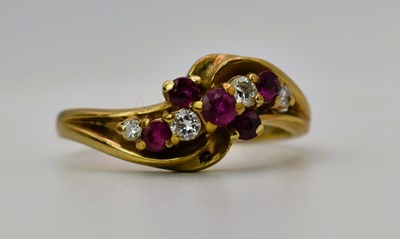 Lot 474 - A 9ct yellow gold, diamond and spinel dress...