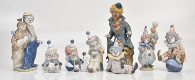 Lot 1440 - LLADRÓ; eight clown figures, height of largest...