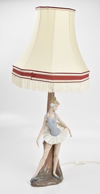 Lot 1486 - NAO; a ballerina figural lamp, with shade,...
