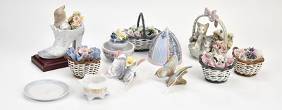 Lot 1462 - LLADRÓ; a collection of flower baskets, a...