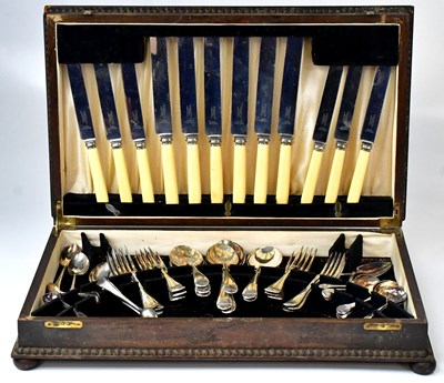 Lot 677 - A wooden cased silver-plated canteen of cutlery