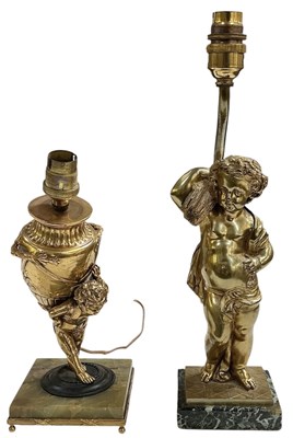 Lot 128 - A reproduction French style brass figural...