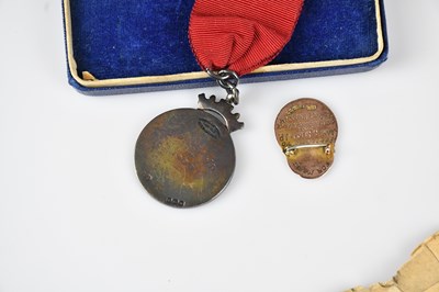 Lot 11 - A 9ct yellow gold and enamel Trade Union...