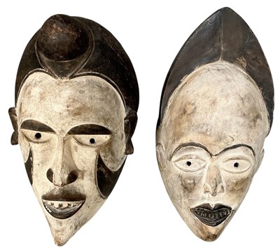 Lot 1020 - Two African carved wooden tribal Punu maiden...