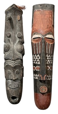 Lot 1028 - An African tribal carved wooden painted Pende...
