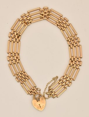 Lot 1414 - A 9ct yellow gold gate link bracelet, with...