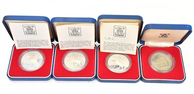 Lot 559 - Three cased sterling silver commemorative...